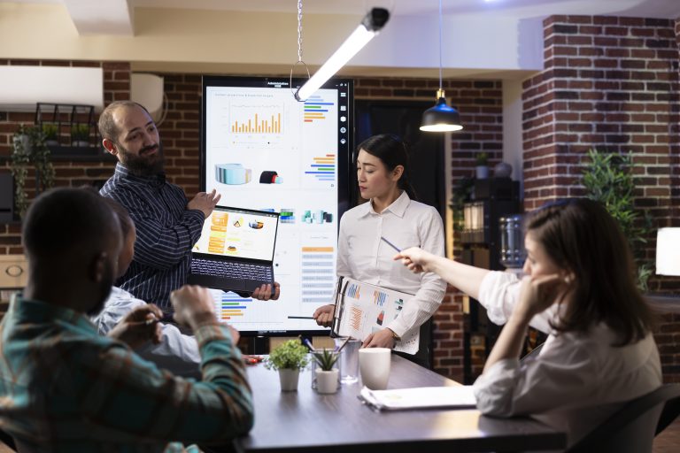 Professionals Present Lead Generation Charts In Meeting
